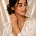 Golden Radiance Crystal Studded Bangle for Women – Elegant Gold-Tone Ribbed Kada Bracelet for Party & Daily Wear