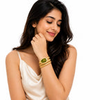 Emerald Glow Gold-Plated Coil Watch for Women – Green Dial Crystal Studded Stretchable Bracelet Watch